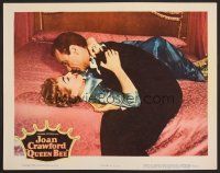 8t580 QUEEN BEE LC '55 close up of Barry Sullivan embracing Joan Crawford on bed!