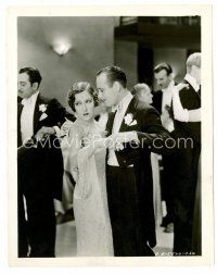 8w398 INDISCREET 8x10 still '31 vertical image of disinterested Gloria Swanson dancing with man!