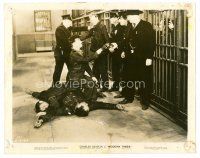 8w494 MODERN TIMES 8x10 still '36 Charlie Chaplin apprehends convicts & gives gun to guard!