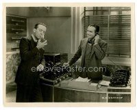 8w571 REACHING FOR THE MOON 8x10 still '30 Douglas Fairbanks Sr. answers phone for receptionist!