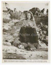 8x490 RITA HAYWORTH 8x10.25 still '59 sitting by a bottle of tequila from They Came to Cordura!