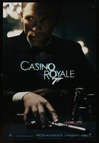 8z203 CASINO ROYALE Spanish/U.S. teaser DS 1sh '06 Craig as James Bond sitting at poker table w/gun!