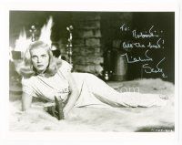 9a076 LIZABETH SCOTT signed 8x10 REPRO still '80s full-length laying on fur rug by fireplace!