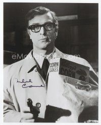 9a078 MICHAEL CAINE signed 8x10 REPRO still '80s great c/u with gun & Corn Flakes from Ipcress File!