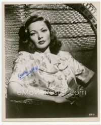 9a058 GENE TIERNEY signed 8x10 REPRO still '80s seated portrait in large wicker chair!
