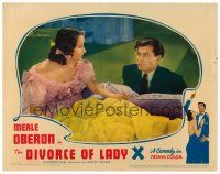 9b014 DIVORCE OF LADY X LC '38 best close up of Laurence Olivier staring at Merle Oberon in bed!