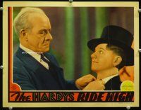 9b354 HARDYS RIDE HIGH LC '39 Lewis Stone adjusts the bowtie of millionaire playboy Mickey Rooney!