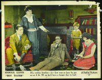 9b379 HOT WATER LC '24 Harold Lloyd sitting by fireplace surrounded byi family!