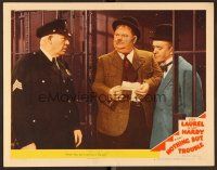 9b541 NOTHING BUT TROUBLE LC #8 '45 Stan Laurel & Oliver Hardy are told by cop to get out of jail!
