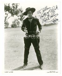 9d105 LASH LA RUE signed 8x10 REPRO still '76 full-length portrait in cowboy gear pointing 2 guns!