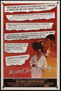 9e993 YEAR OF LIVING DANGEROUSLY 1sh '83 Peter Weir, Mel Gibson, art by Bob Peak & Stapleton!