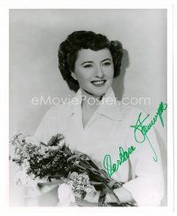 9g067 BARBARA STANWYCK signed 8x10 REPRO still '80s smiling portrait holding bouquet of flowers!