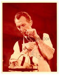 9z277 PETER CUSHING signed color 8x10 REPRO still '70s as Dr. Frankenstein drilling into guy's head!