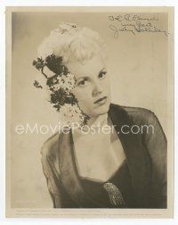 1e237 JUDY HOLLIDAY signed 8x10 still '50 head & shoulders portrait with flowers in her hair!