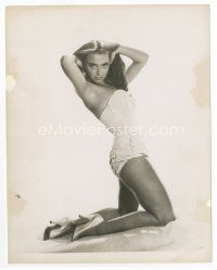 1m184 APRIL OLRICH 8x10.25 still '57 full-length c/u of the actress on her knees in skimpy outfit!