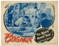 1x005 TO HAVE & HAVE NOT LC '44 Lauren Bacall & three others watch Humphrey Bogart operate!