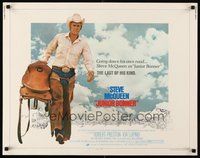 2c215 JUNIOR BONNER 1/2sh '72 full-length rodeo cowboy Steve McQueen carrying saddle!