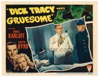 2j236 DICK TRACY MEETS GRUESOME LC #5 '47 cop watches Boris Karloff examine wounded man!
