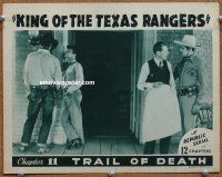 2j446 KING OF THE TEXAS RANGERS chap 11 LC '41 Rangers questioning men outside saloon!