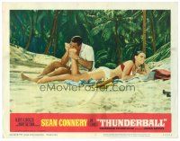 2j831 THUNDERBALL LC #5 '65 Sean Connery as James Bond on beach biting sexy Claudine Auger's foot!