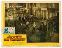 2j928 WESTERNER LC '40 Gary Cooper, cool far shot of cowboys in showdown on city street!