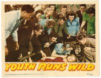 2j997 YOUTH RUNS WILD LC '44 Val Lewton, big crowd gathers around unconscious Bonita Granville!