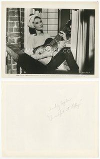 2k088 AUDREY HEPBURN 8x10.25 still '63 close up playing guitar in window from Breakfast at Tiffany's