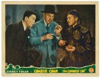 2t116 CHINESE CAT LC '44 amazed Benson Fong watches Sidney Toler as Charlie Chan examine clue!