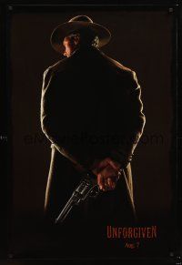 2y758 UNFORGIVEN dated teaser 1sh '92 classic image of gunslinger Clint Eastwood with back turned!