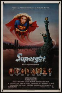 2z757 SUPERGIRL 1sh '84 super Helen Slater in costume flying over Statue of Liberty!