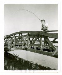 3k155 COLEEN GRAY candid 8x10 still '51 ful-length fishing on bridge, excited she caught a trout!