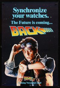 3y057 BACK TO THE FUTURE II teaser DS 1sh '89 Michael J. Fox as Marty, synchronize your watch!