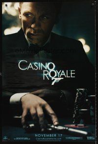 3y136 CASINO ROYALE teaser 1sh '06 Daniel Craig as James Bond sitting at poker table w/gun!