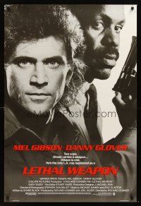 3y529 LETHAL WEAPON advance 1sh '87 great close image of cop partners Mel Gibson & Danny Glover!