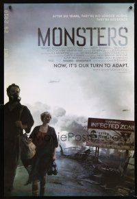 3y587 MONSTERS advance 1sh '10 Gareth Edwards, cool image of couple w/gas masks!