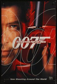 3y827 TOMORROW NEVER DIES teaser 1sh '97 super close image of Pierce Brosnan as James Bond 007!