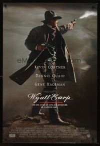 3y892 WYATT EARP advance DS 1sh '94 cool image of Kevin Costner in the title role firing gun!