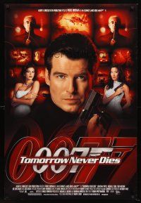 3z309 TOMORROW NEVER DIES signed DS 1sh '97 by Pierce Brosnan, great close up as James Bond!