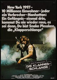 4b072 ESCAPE FROM NEW YORK German '81 John Carpenter, cool image of Kurt Russell w/rifle!