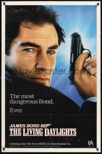 4g564 LIVING DAYLIGHTS teaser 1sh '87 super close up of Timothy Dalton as James Bond with gun!
