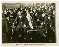 4h039 50,000,000 FRENCHMEN 8x10 still '31 wacky image of Olsen & Johnson chased by lots of police!