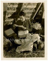 4h104 BIG PARADE 8x10 still '25 John Gilbert reading a letter that came with package from home!