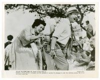 4h526 PICNIC 8x10 still R64 Rosalind Russell pours water in bottle in Arthur O'Connell's pants!