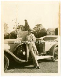 4h584 ROD LA ROCQUE candid 8x10 still '20s standing full-length by his new foreign motor purchase!