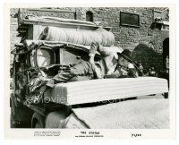 4h643 STATUE 8x10 still '71 wacky David Niven laying on truck loaded with furniture!
