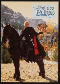5g928 LADYHAWKE German LC '85 great close up of Rutger Hauer on horseback holding falcon!