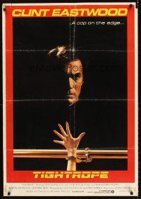 5j023 TIGHTROPE Lebanese '84 Clint Eastwood is a cop on the edge, cool handcuff image!