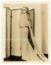 6w047 CAROLE LOMBARD 8x10 still '30s full-length standing in front of screen in sexiest gown!