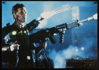 7b403 ERASER teaser German '96 different image of Arnold Schwarzenegger w/two wacky guns!