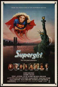 7c614 SUPERGIRL 1sh '84 super Helen Slater in costume flying over Statue of Liberty!